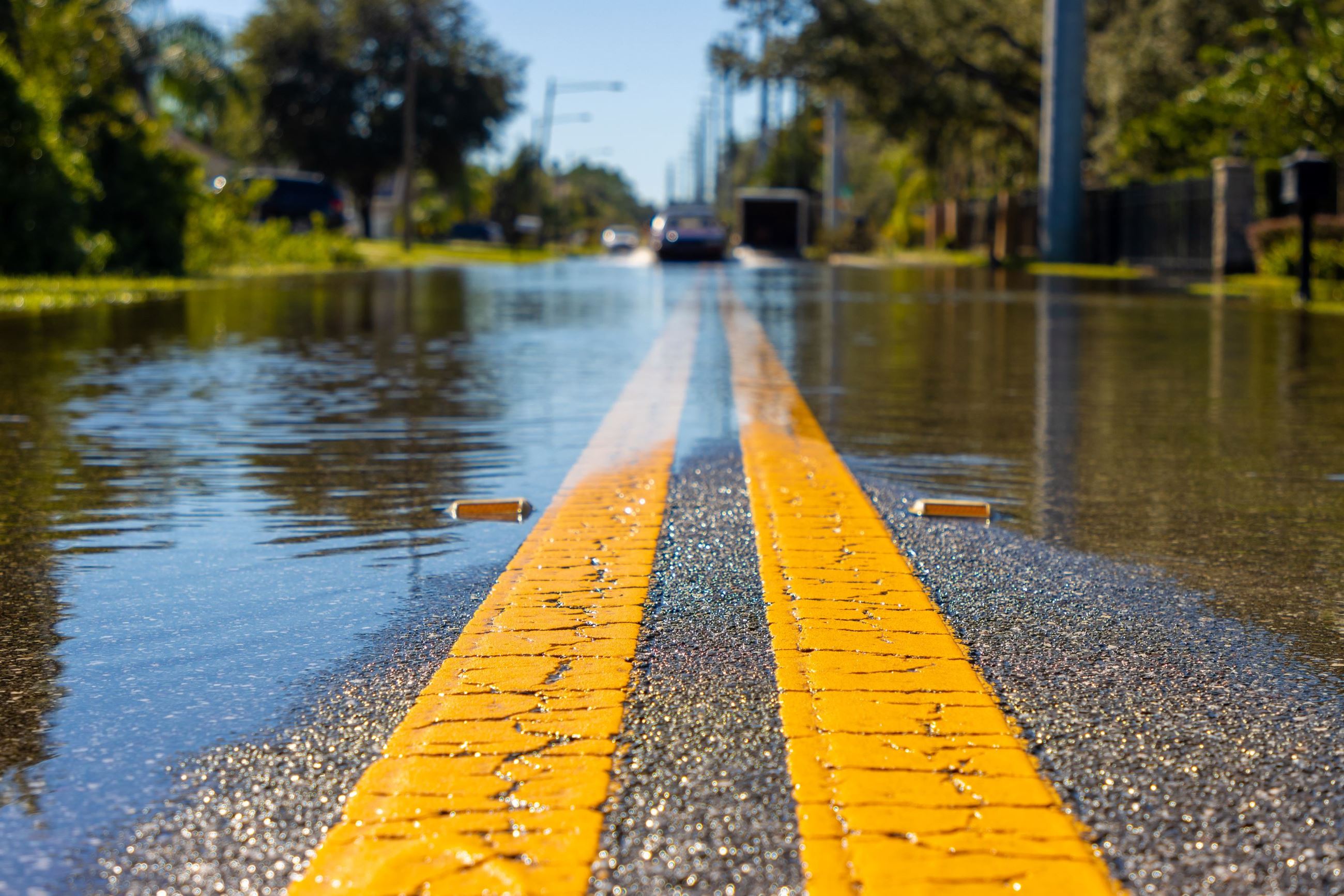 Car driving on a flooded street