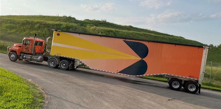 a large hauling truck outside 