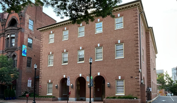 30 North Market Street, a brick building in downtown Frederick. 